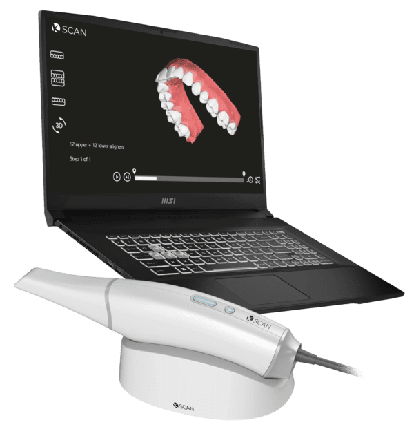 A laptop computer with a tooth brush on the screen.